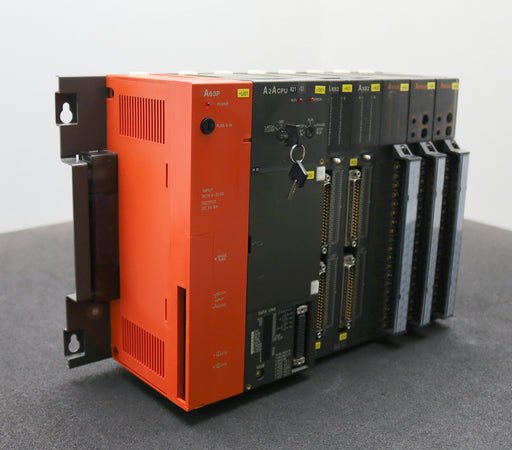 Bild des Artikels MITSUBISHI-MELSEC-PLC-System-bestehend-aus-1x-A63P-1x-A2ACPU-1x-AY13E-2x-AX82